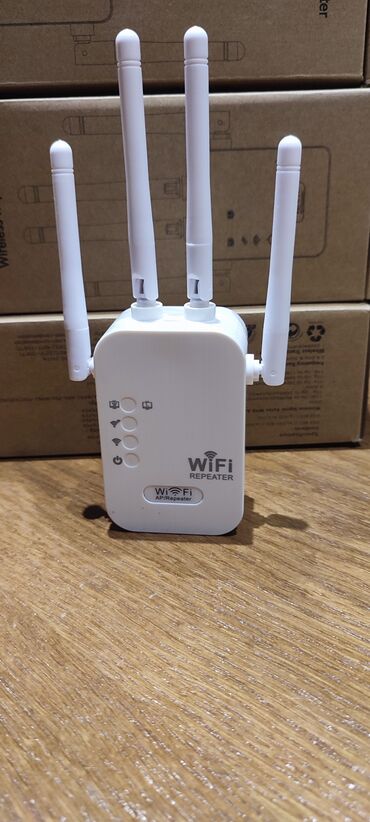 Modemi, ruteri i mrežni uređaji: Wi fi extender -pojačivač signala povećava domet postojeće wi fi
