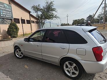 Транспорт: Mazda 323: 2002 г., 1.6 л, Механика, Бензин, Универсал — 5