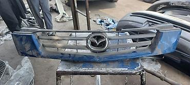 Решетки радиатора: Решетка радиатора Mazda Оригинал — 6