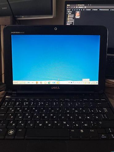 atom: Нетбук Dell Inspiron Mini 1018 — компактный вишнёво‑красный субноутбук — 1