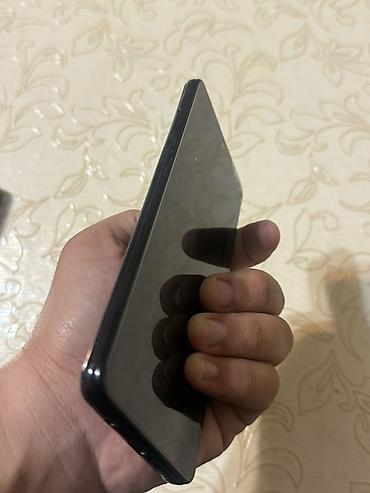 smart mini telefon: Samsung Galaxy A51, Barmaq izi — 3