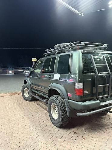 Унаа: Isuzu Bighorn: 2002 г., 3.5 л, Автомат, Бензин, Жол тандабас — 4