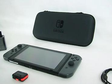 Nintendo Switch: Uz konzolu dolazi: Tablet (konzola) Joy-Con džojstici Punjač — 8