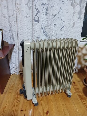 su radiatoru ev ucun: Elektrikli qızdırıcılar və radiatorlar