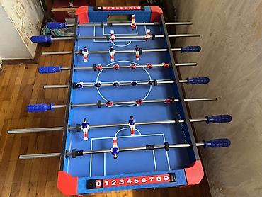 Stolüstü futbol (foosball) masası ideaı qalib 8 cubuqludur