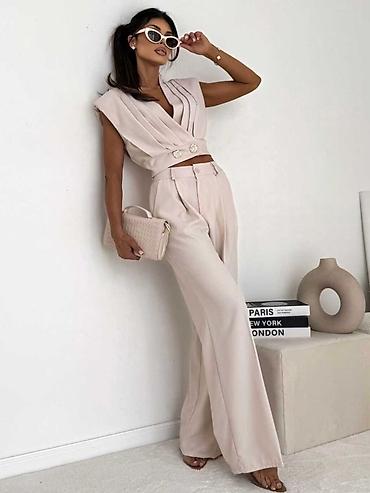 Kompleti: 🔥Ženski elegantni komplet – prsluk crop i široke pantalone
✅3200 din — 6