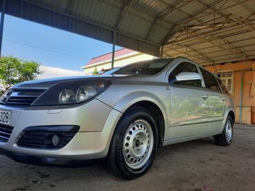 naxcivan maşın elanları 075: Opel Astra: 1.3 l | 2006 il | 470403 km Universal