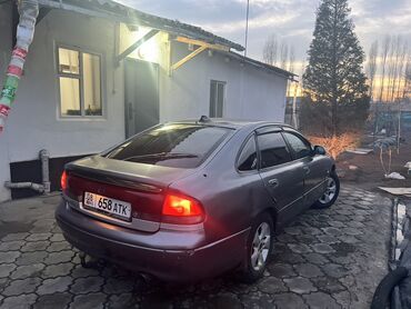 Mazda: Mazda 626: 1994 г., Хэтчбэк — 1