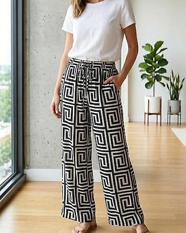 evolution haljine: Pantalone sarene u cetiri razlicita dizajna u crno/bele kombinacije — 1