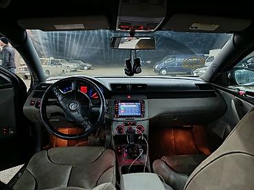 Volkswagen: Volkswagen Passat: 2 l | 2006 il Sedan — 4