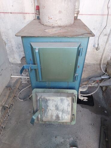 печка для отапления: Продам котёл твёрдо и электричество месте с трубой 5 мтр азбес