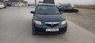 обмен с доплатой: Mazda Demio: 2003 г., Автомат, Бензин — 2