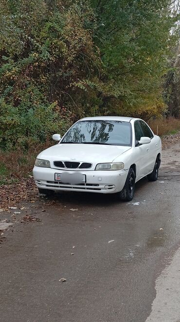 аварийные машыны: Daewoo Nubira: 1999 г., 1.5 л, Механика, Бензин, Седан