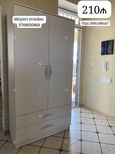 taxt uzu: Ağ rəngli ikiqapılı şkaf - Ölçü: 200 x 100 x 47 sm (şəkildə — 1