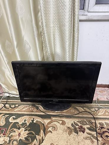 круглый: Телевизор Panasonic, диагональ около 32". Плоская панель, настольная — 2