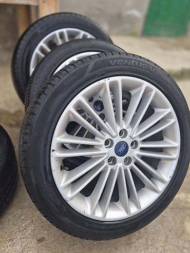 фургоны категории б: Ford üçün orijinal yüngül lehimli disklər və təkər komplekti - — 1