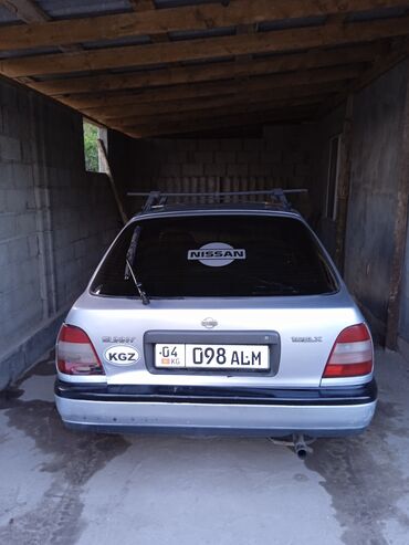 где купить наклейки на машину для выписки из роддома: Автомобиль Nissan Sunny серебристого цвета с кузовом седан. Оснащен