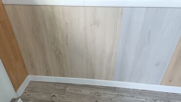 Laminat: Məhsul: Laminat döşəmə örtükləri və aksesuarları Təsvir: - Mağazada — 11