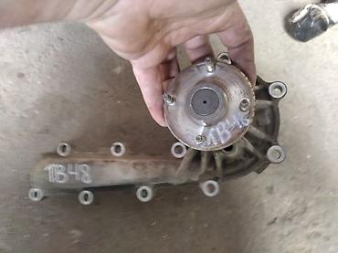 down pipe: Помпа Nissan Б/у, Оригинал — 2