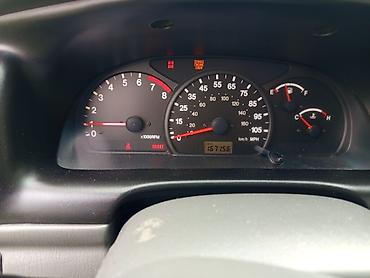 Digər avtomobillər: === PART 1: TEXTUAL DESCRIPTION === Qara rəngdə Chevrolet Tracker SUV — 11