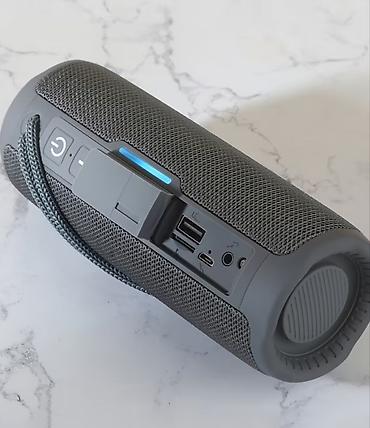 dji mini mic: Портативная Bluetooth‑колонка цилиндрической формы с тканевой — 1