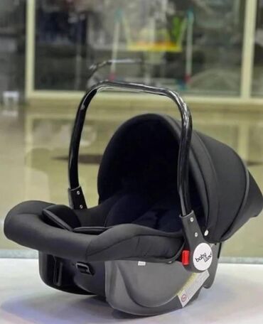 BabyLux markalı, qara rəngli uşaq daşıyıcısı təhlükəsiz və rahat