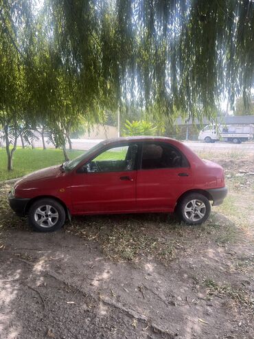 крышка багажника демио: Mazda 121: 1994 г., 1.3 л, Механика, Бензин