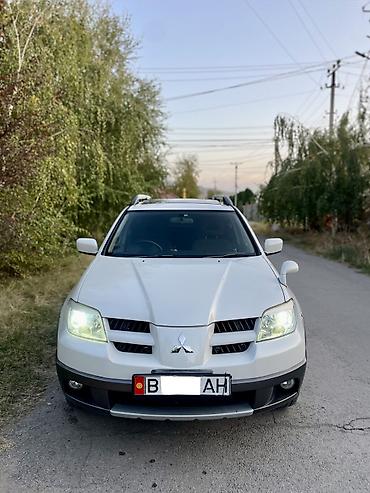 шины 14 радиус 18565: Mitsubishi Airtrek: 2004 г., 2.4 л, Автомат, Газ, Кроссовер — 2