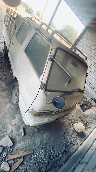авто краны: Грузовой мини‑пикап Kia (двухрядная кабина) Описание: - Компактный — 1