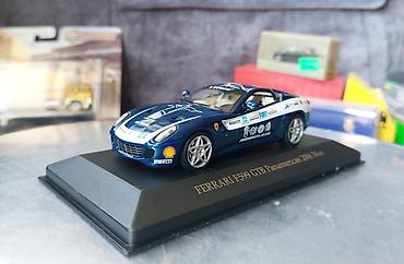 Avtomobil modelləri: Коллекционная модель Ferrari F599 GTB Panamerican blue metallic 2006 — 9
