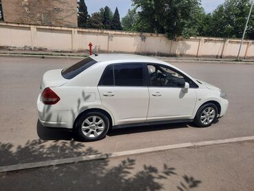 бампера гольф 2: Nissan Tiida: 1.6 l | 2008 il Sedan