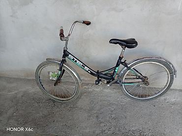 velosipedlər isma: STELS Pilot 24 şəhər/komfort tipli velosiped.Nasosda üstündə verilir — 3
