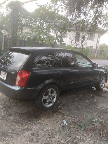 мазда фамили: Mazda Familia: 2003 г., 1.6 л, Механика, Бензин, Универсал — 3