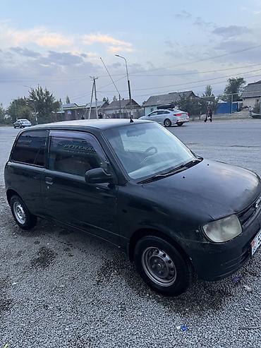 муравей с бензином: Daihatsu Cuore: 2001 г., 1 л, Механика, Бензин, Купе — 6