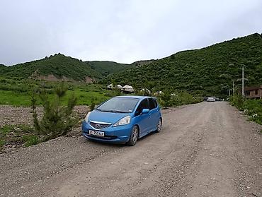 xpeng g3: Honda Fit: 2009 г., 1.5 л, Механика, Бензин, Хэтчбэк — 6