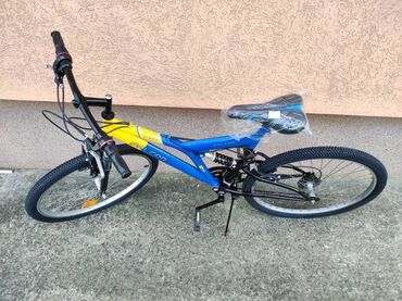polovni deciji bicikli sa pomocnim tockovima: Bicikl Falcon plavo-zuta 26" sa amortizerima Bicikla Falcon