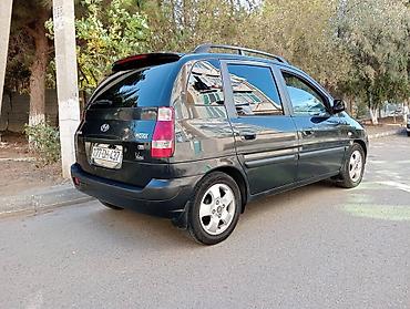ford focus hatchback: Hyundai Matrix: 1.5 l | 2007 il Sedan — 2