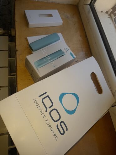 Qəlyan, vayp və aksesuarları: IQOS ILUMA ONE (Yeni rəng – açıq mavi) Komplekt: - IQOS ILUMA ONE