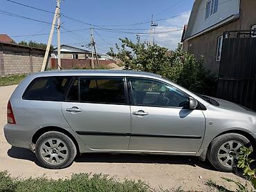 Унаа: Toyota Corolla: 2003 г., 1.6 л, Кол менен иштөөчү, Универсал — 4