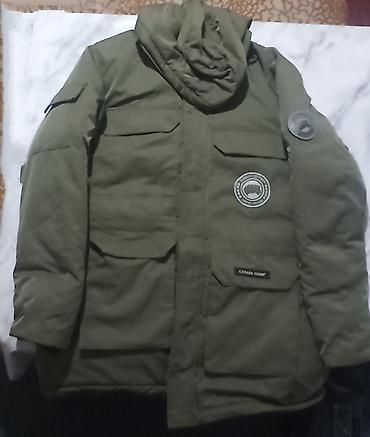 gore tex купить: Пуховая зимняя парка цвета хаки. Особенности: - Тёплый плотный — 1