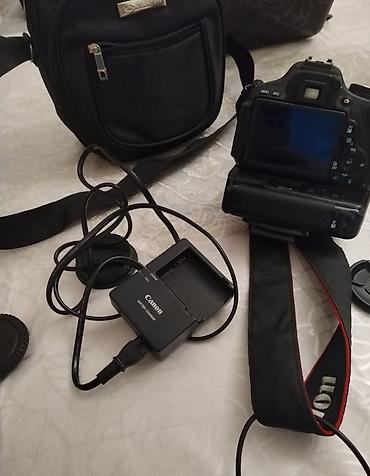rəsmi note 10s: Canon 600d barter olunur ve satilir. 1.grip bateraka bloku 2. lens — 3