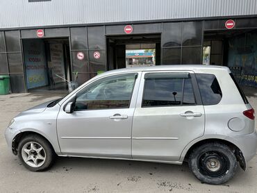 Mazda: Mazda Demio: 2005 г., 1.3 л, Автомат, Бензин, Седан