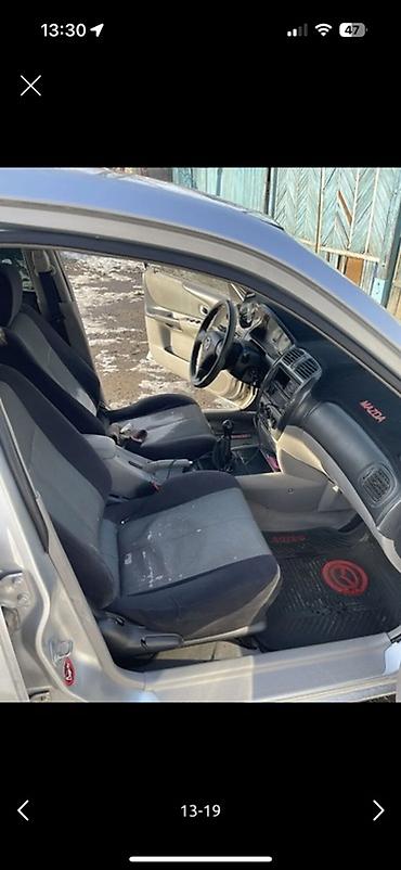 Mazda: Mazda 323: 2004 г., Хэтчбэк — 12