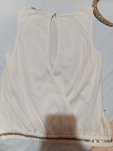 Kompleti: Ženski komplet – 3 topa + rajf - Elegantan krem bezrukavnik sa — 3