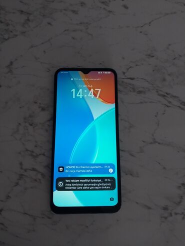 iphone 15 satilir: Honor X6, 64 GB, rəng - Göy, Düyməli, Barmaq izi, Sensor