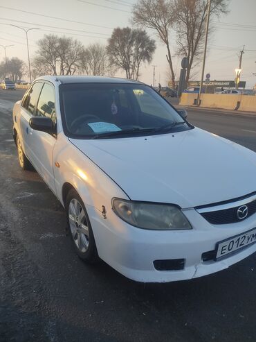 Mazda: Mazda Familia: 2001 г., 1.5 л, Автомат, Бензин, Седан