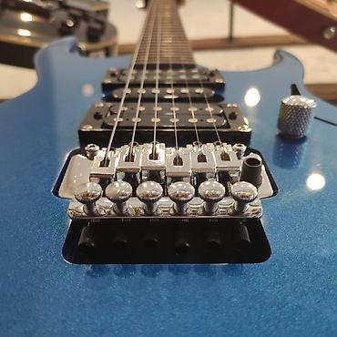 Gitaralar: Elektro-gitara Smiger S-G5 BL Simlərin sayı: 6 Üst: Cökə ağacı Qol — 2