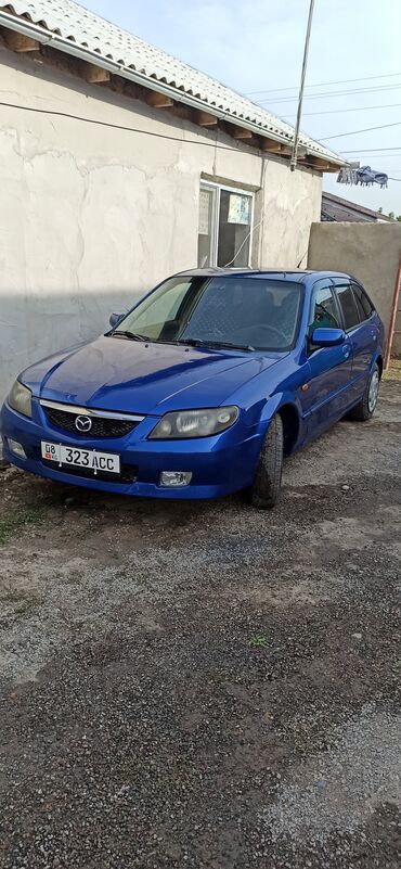 Mazda: Mazda 323: 2002 г., 1.6 л, Механика, Бензин, Хэтчбэк