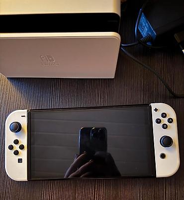 Nintendo Switch: Nintendo Switch Oled. Ag rengde. Bir nece aydir almisham, cox az — 2