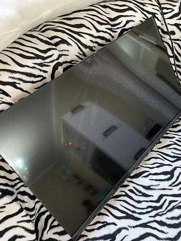 iphone cs max: Телевизор с Android TV (логотип Powered by Android на экране) — 3